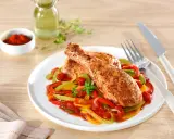 Poulet basquaise cookeo : des cuisses de poulet savoureuses sur un lit de poivrons colorés et de tomates. Un plat plein de saveurs.